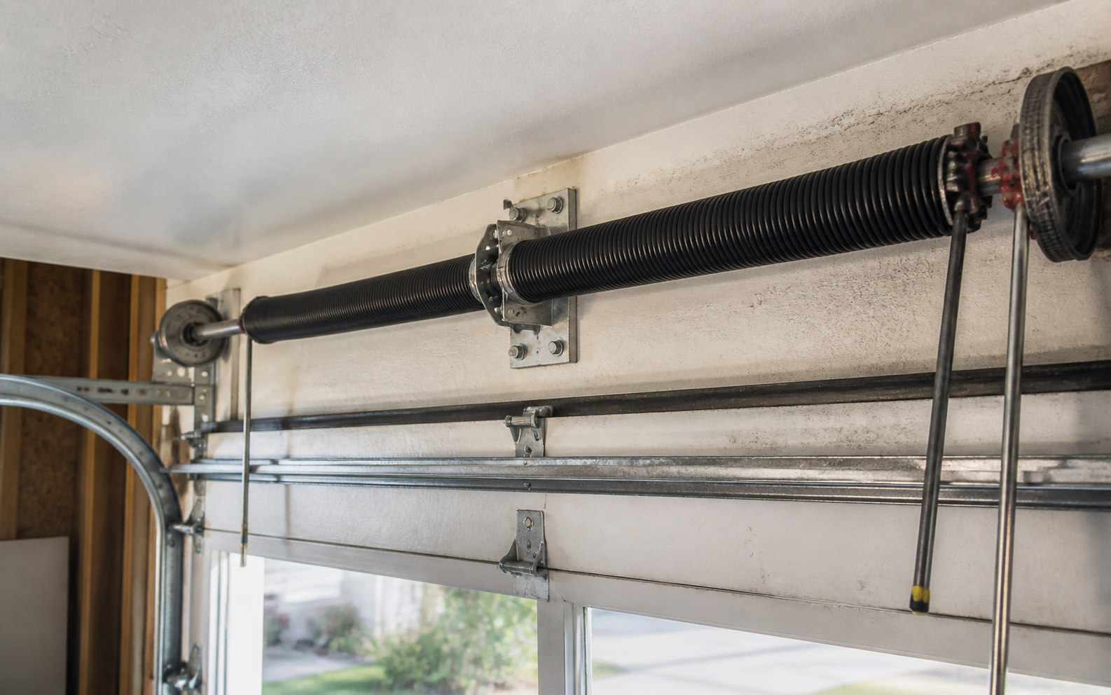 Garage door torsion spring replacement Winnipeg